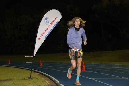 Camille Herron running through the night at the Sri Chinmoy 48-hour race in Canberra March 2023